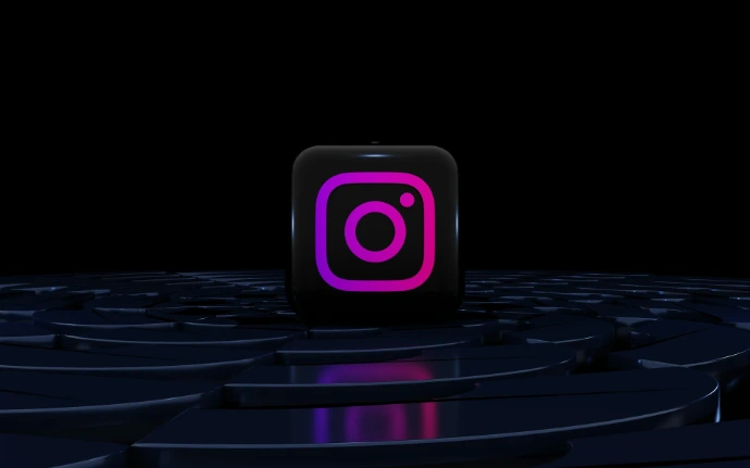 a purple instagram logo on a black background